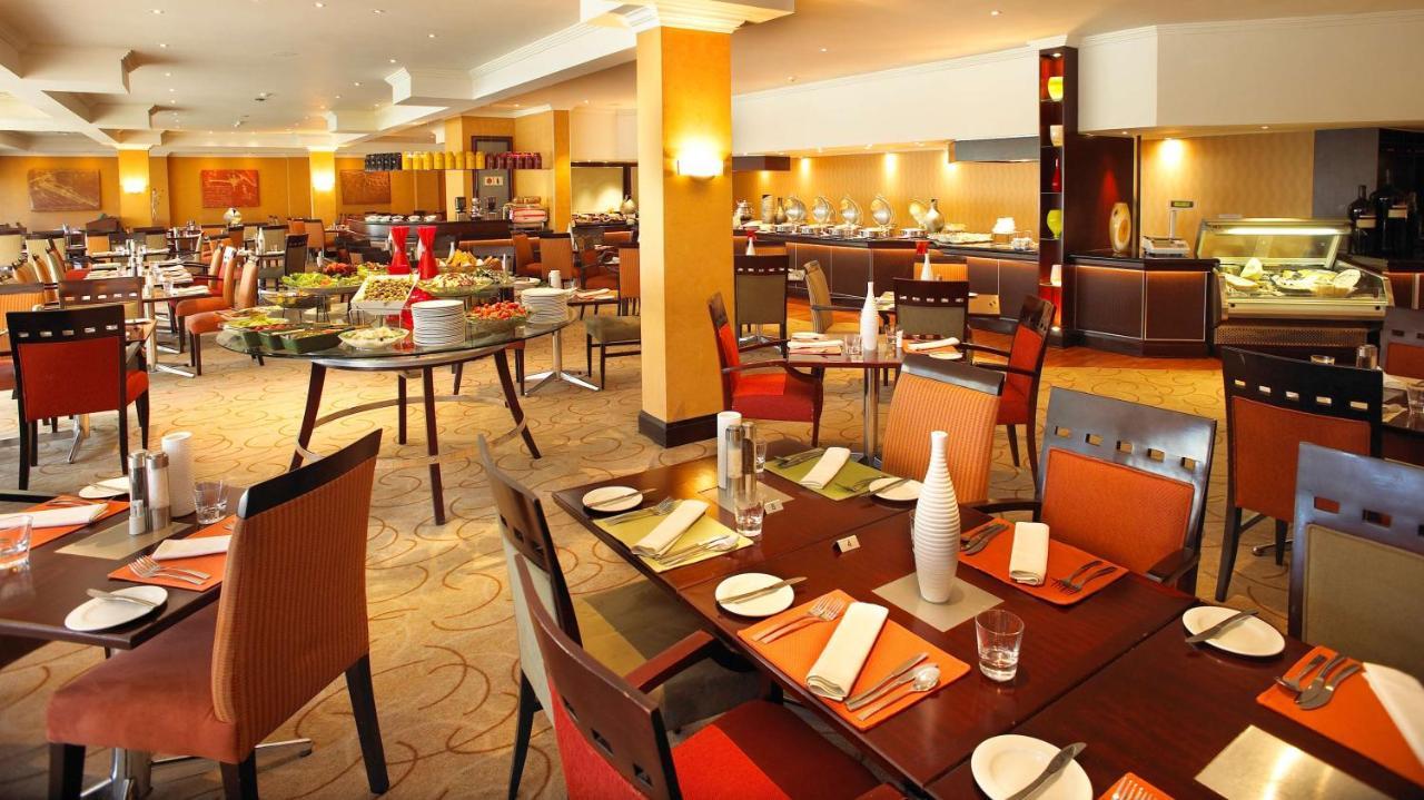 Southern Sun Or Tambo International Airport Kempton Park Exterior photo A restaurant in Johannesburg, South Africa