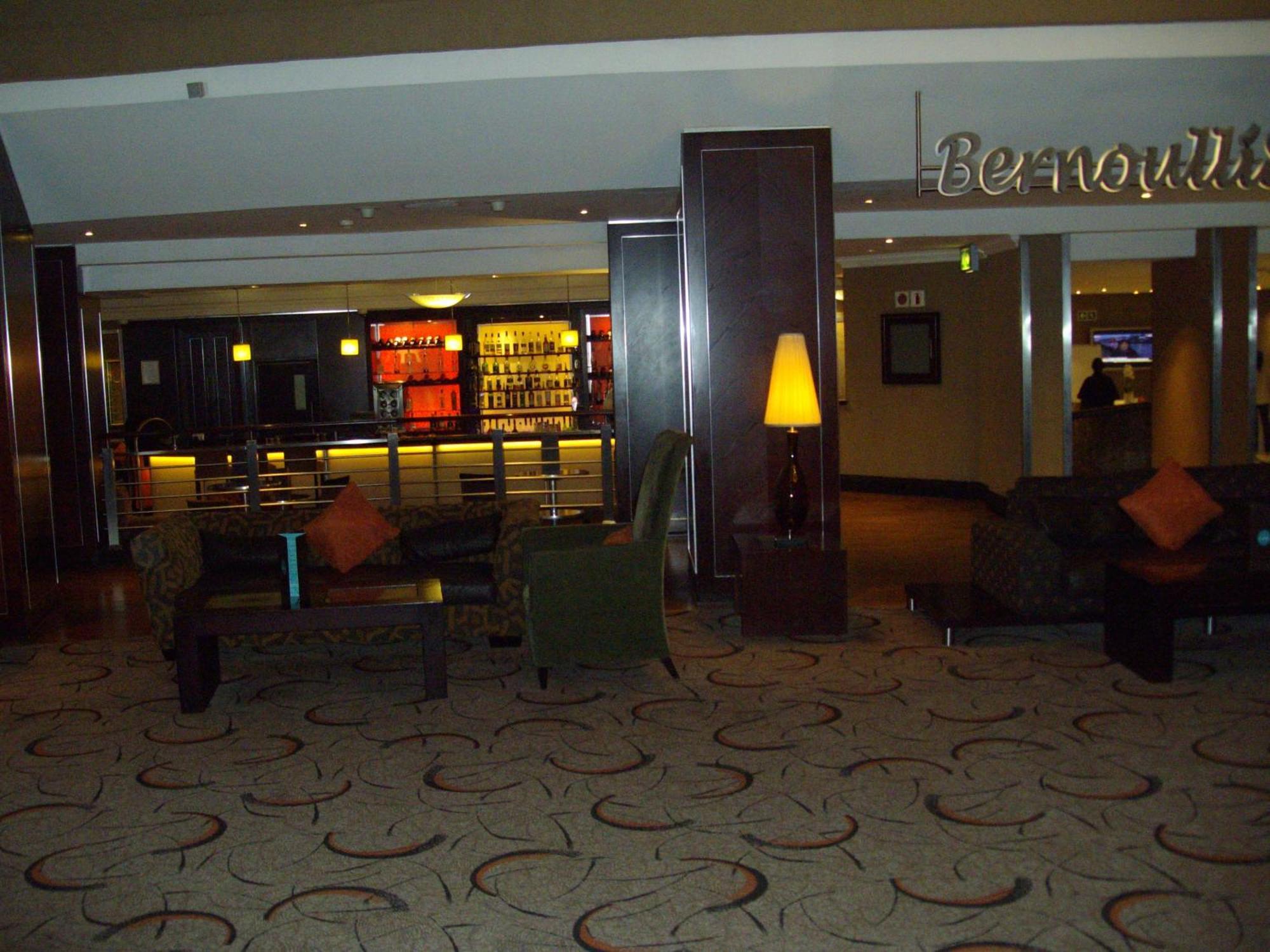 Southern Sun Or Tambo International Airport Kempton Park Exterior photo The reception area of the hotel