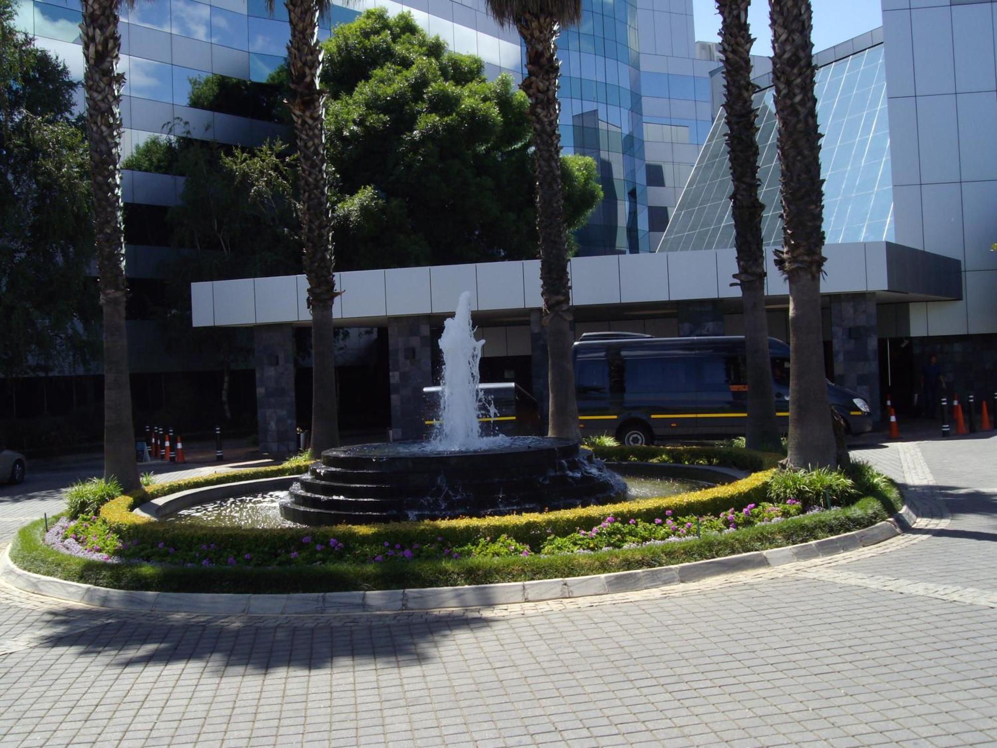 Southern Sun Or Tambo International Airport Kempton Park Exterior photo Fountain at the entrance of the building